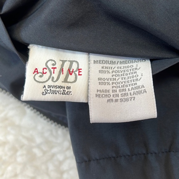 St. John’s Bay Reversible Vest- purple fleece one side and Black nylon other. - Picture 3 of 4